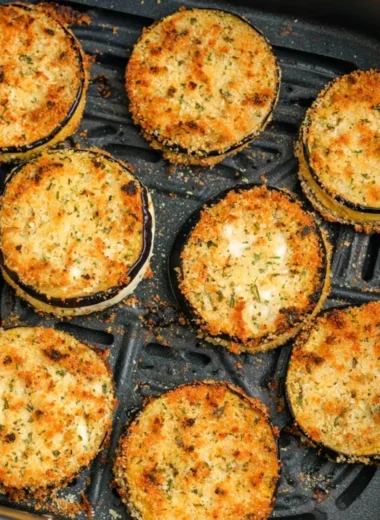 Delicious air fryer eggplant slices topped with seasoning
