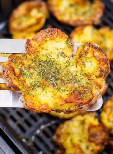 Crispy air fryer smashed potatoes seasoned and golden brown