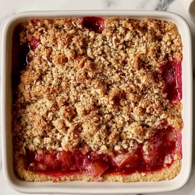 Classic rhubarb crumble bars with a golden crumble topping