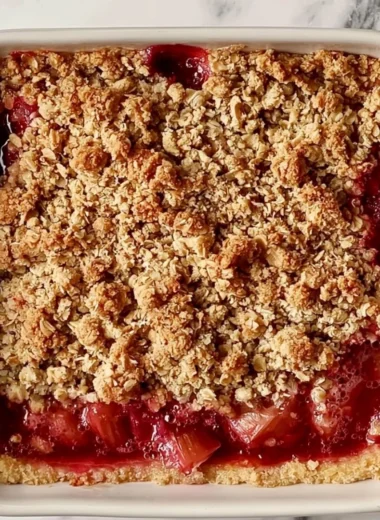 Classic rhubarb crumble bars with a golden crumble topping