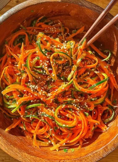 Fresh cucumber carrot salad with vibrant colors and healthy ingredients