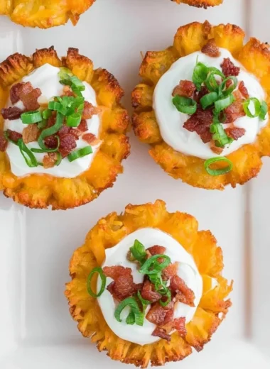 Delicious loaded tater tots with toppings, perfect for appetizers