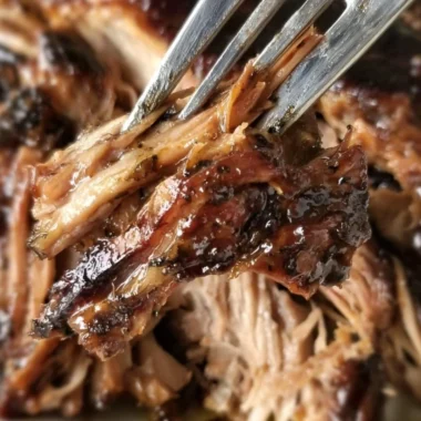 Slow cooker balsamic brown sugar pork roast served with vegetables