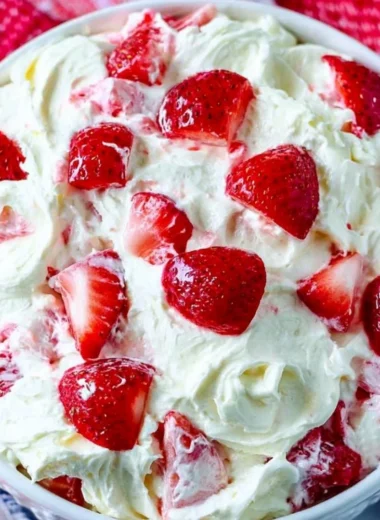 Delicious summer cheesecake salad with fresh fruit and creamy topping