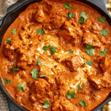 Delicious Chicken Tikka Masala served with rice and naan