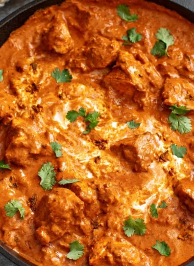 Delicious Chicken Tikka Masala served with rice and naan
