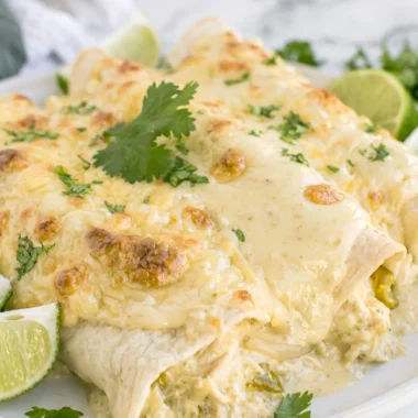 Delicious creamy white chicken enchiladas served on a plate