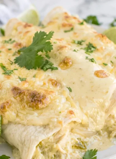 Delicious creamy white chicken enchiladas served on a plate