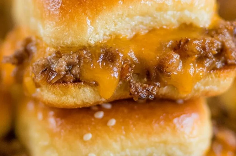 Delicious cheeseburger sliders made with Hawaiian rolls, perfect for parties.