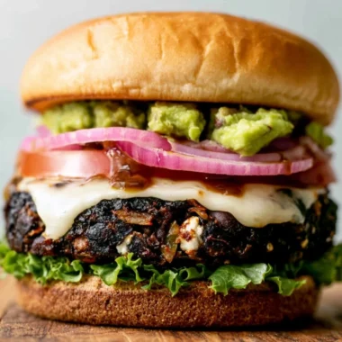 Ground turkey black bean burger served with fresh veggies and condiments