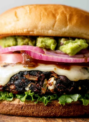 Ground turkey black bean burger served with fresh veggies and condiments