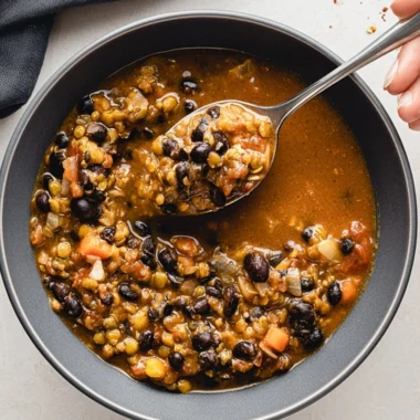 Delicious and nutritious protein-packed black bean and lentil soup in a bowl