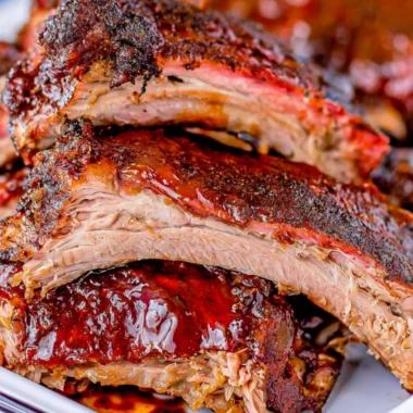 Mouthwatering smoked ribs served with barbecue sauce and sides.