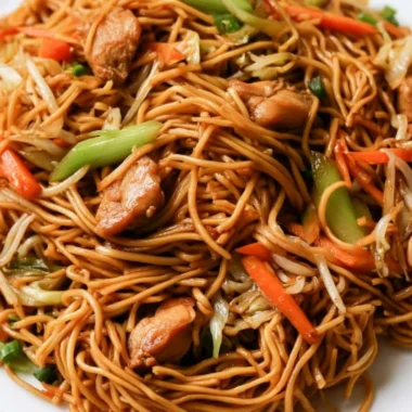 Easy 30-minute Chicken Chow Mein served in a bowl with colorful vegetables