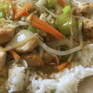 Delicious Cantonese Chicken Chow Mein served with vegetables and noodles