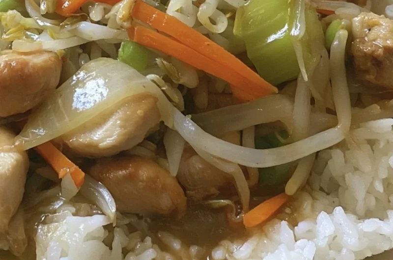 Delicious Cantonese Chicken Chow Mein served with vegetables and noodles