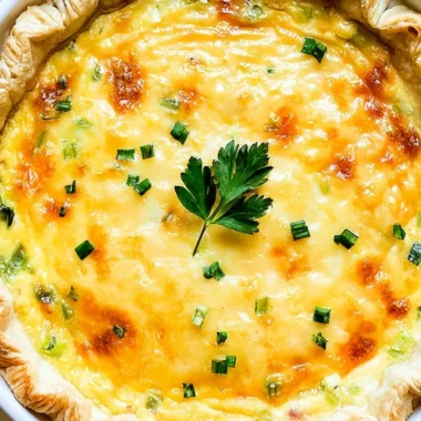Delicious Classic Quiche Lorraine filled with cheese and bacon, freshly baked